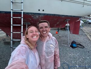 Fran and Jack covered in antifoul dust after a day of sanding