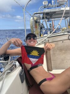 Fran holding the Antigua flag